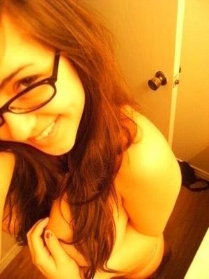 Thick Amateur in Glasses showing off chest and stomach