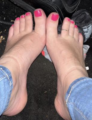 Ash removing socks, showing sweaty toes