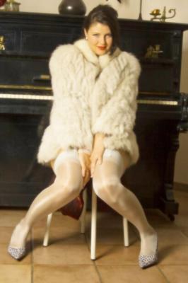 Mdm. Catherine, ladylike (posing in shiny stockings)