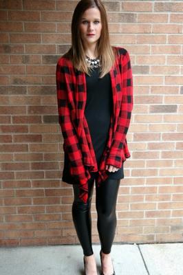 Cute pair of blog chicks in leather leggings and boots