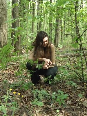 Mistress switching her slave in the woods