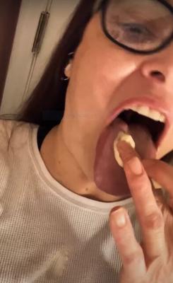 in glasses licking pudding