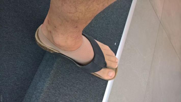 he naked feet at work
