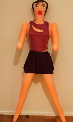 Boneca asiática top roxo saia roxa