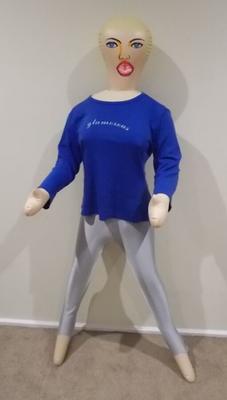 Love doll wears silver leggings and a blue top
