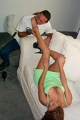 Foot worship on white sofa