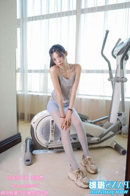 Sexy teen in blue pantyhose working out at Gym