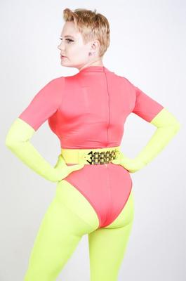 Non nude stock image short hair yellow red leotard super hero fe