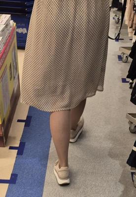 Young mommy in tan pamtyhose and dress