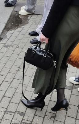 Woman in long skirt and heels
