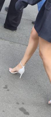 Girl in white sandal heels