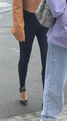 Woman in leggins and suede heels