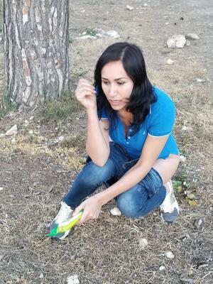 Yana pees in the forest