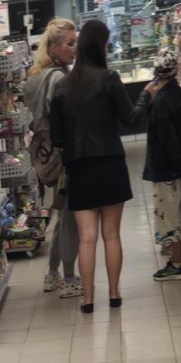 Girl in mini skirt and ballerinas shoes