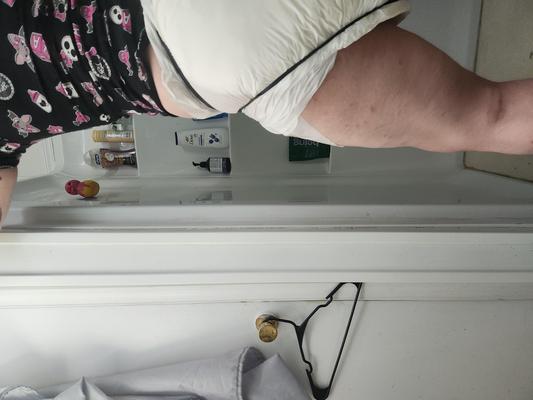 Diapered loser leaks all over
